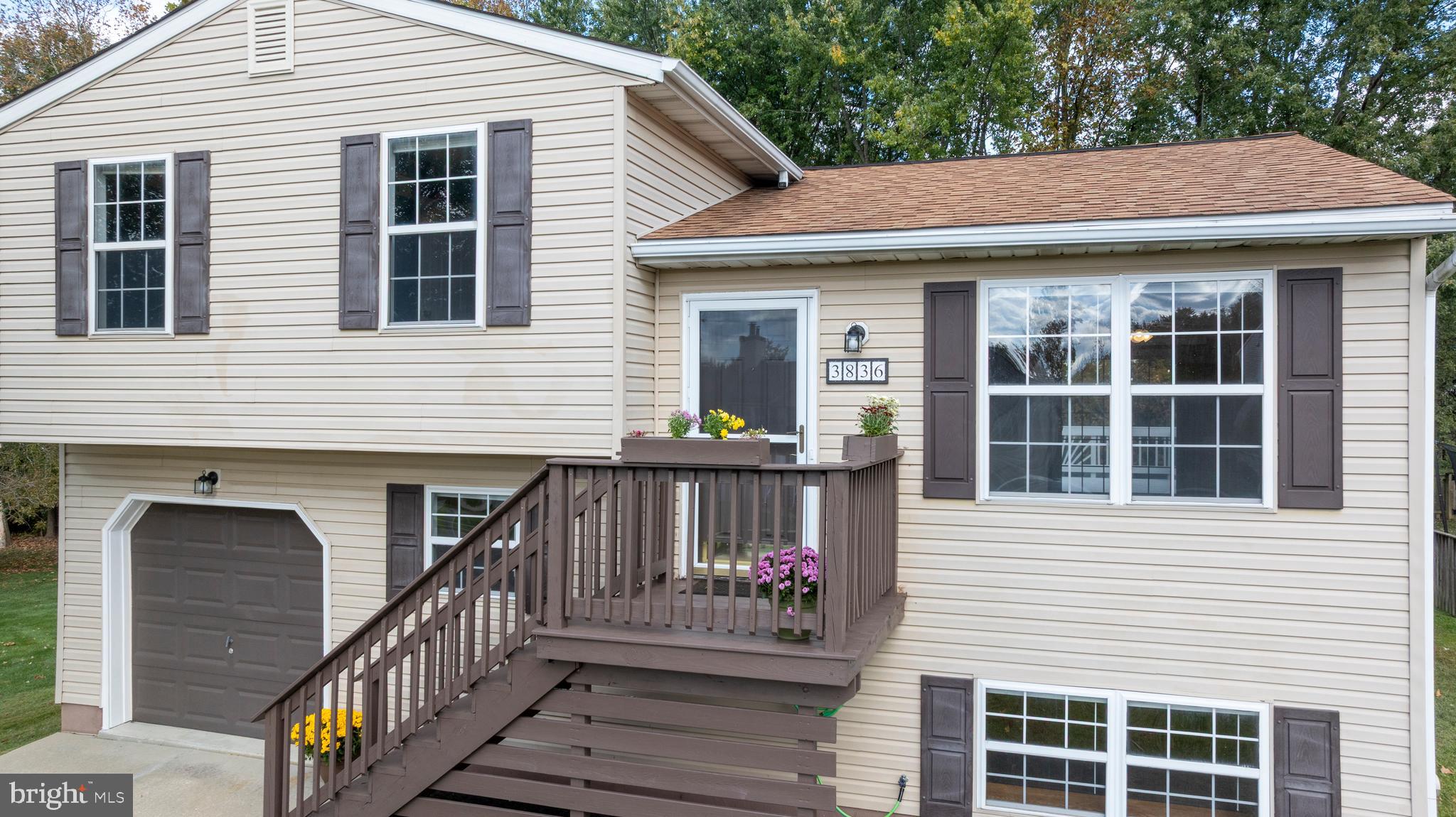 3836 Dakota Road Hampstead, MD 21074 - Photo 38 of 47 a view of a house with large windows