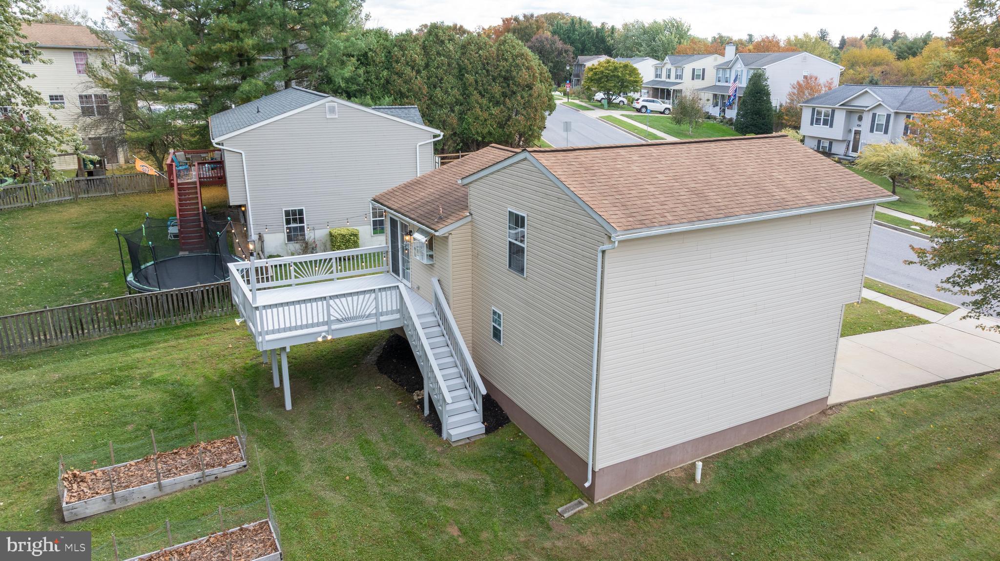 3836 Dakota Road Hampstead, MD 21074 - Photo 42 of 47 a aerial view of a house with table and chairs
