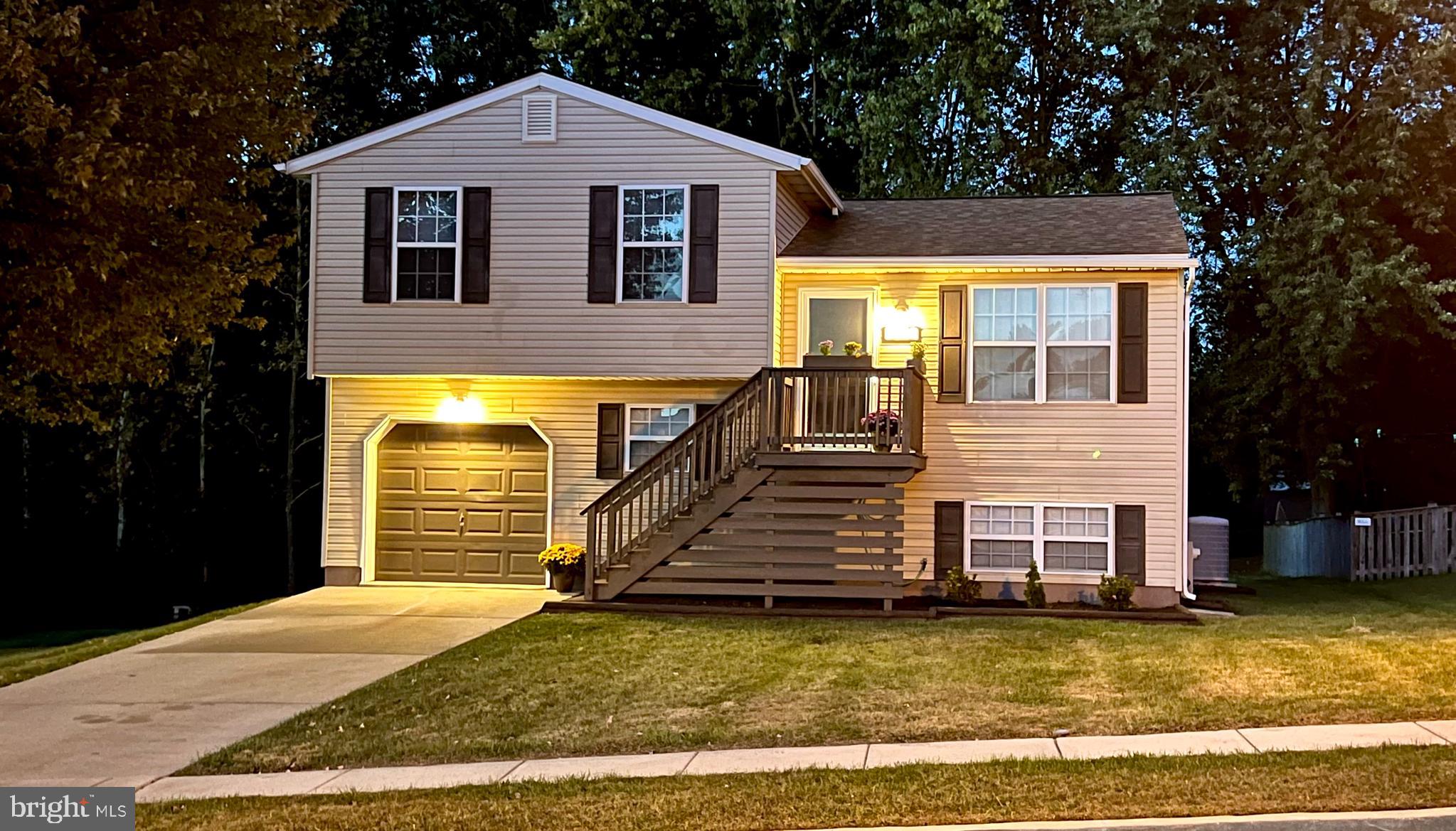 3836 Dakota Road Hampstead, MD 21074 - Photo 47 of 47 a front view of a house with a yard