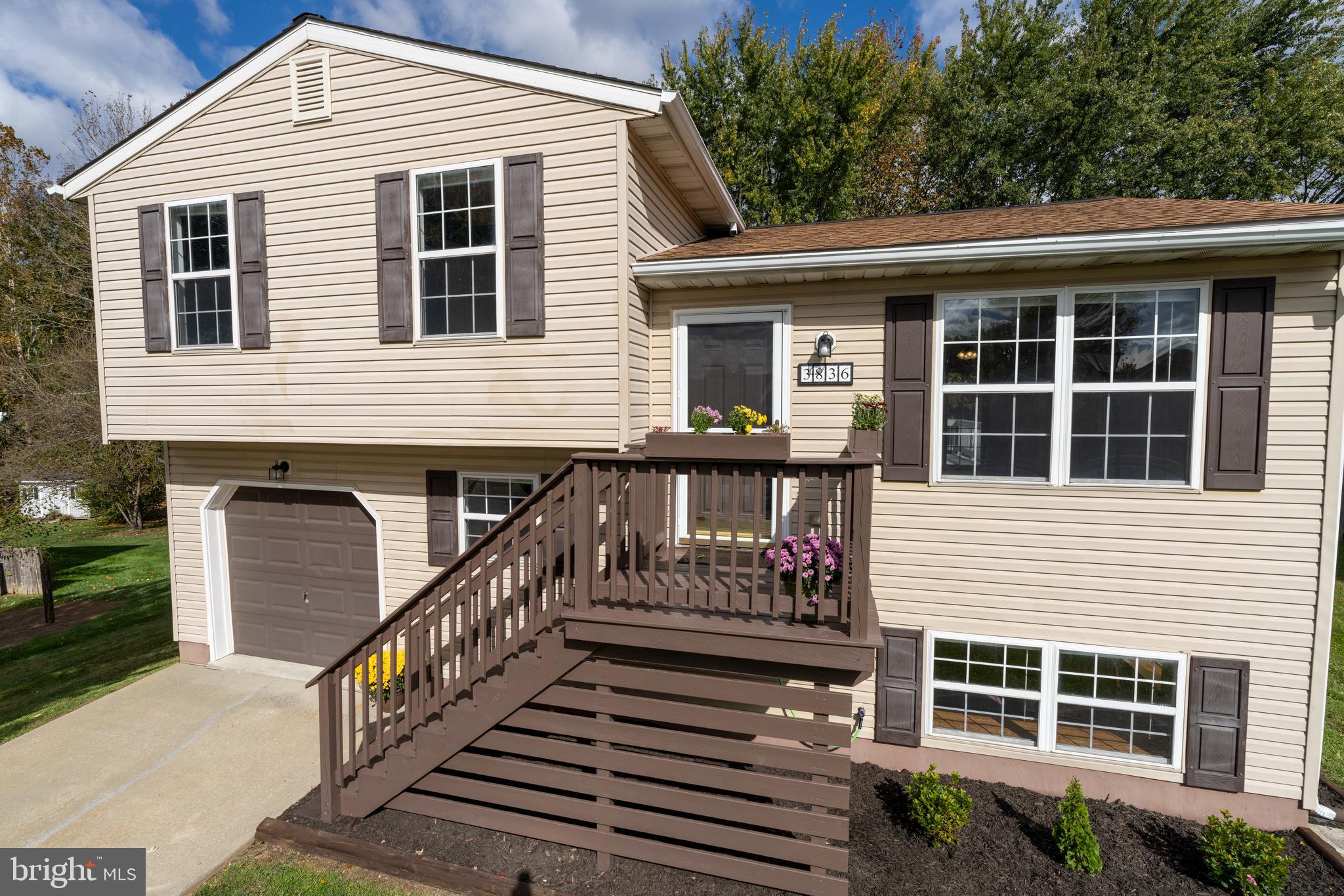 3836 Dakota Road Hampstead, MD 21074 - Photo 5 of 47 a front view of a house with balcony