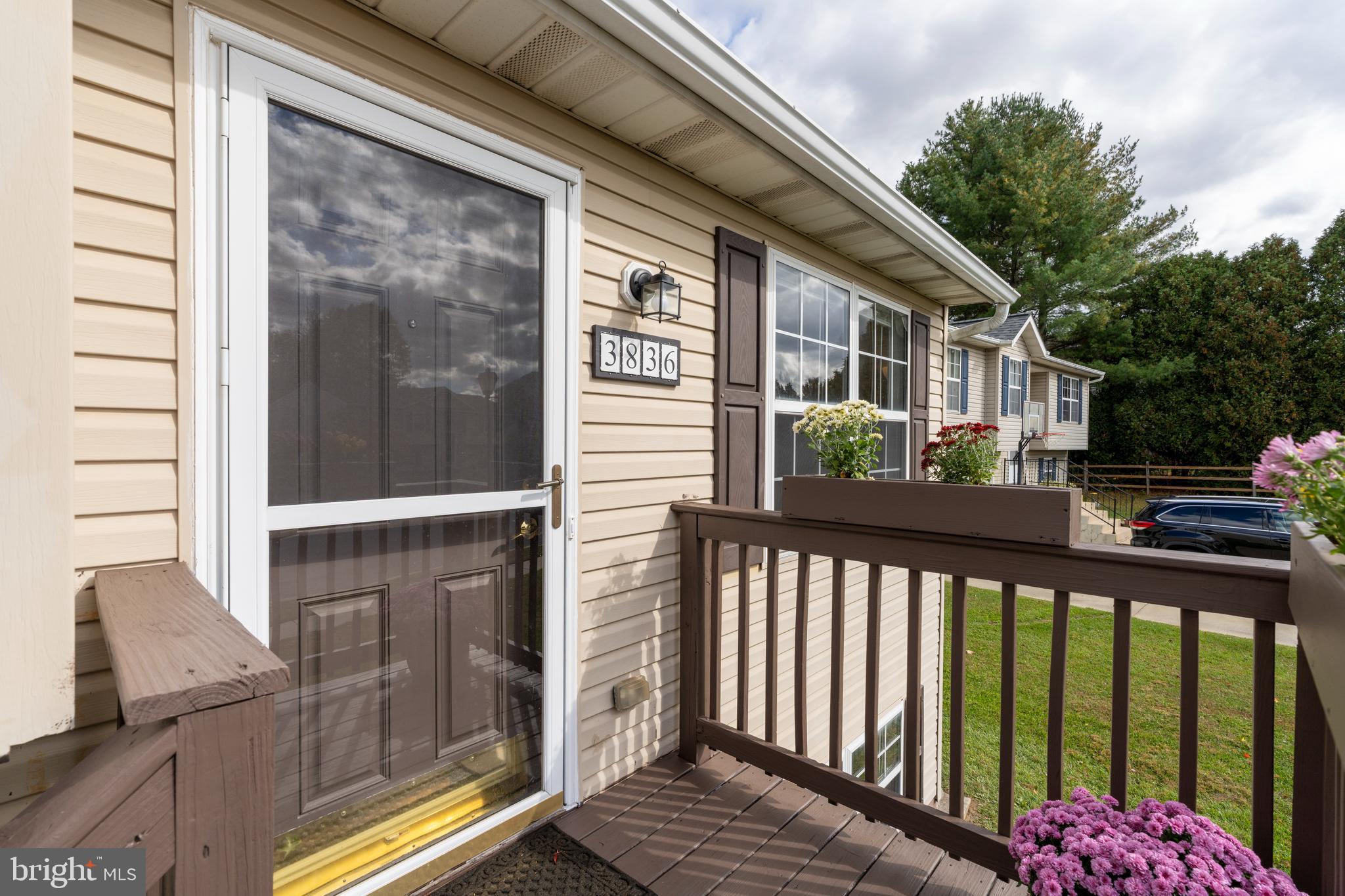 3836 Dakota Road Hampstead, MD 21074 - Photo 6 of 47 a view of a balcony with a potted plant