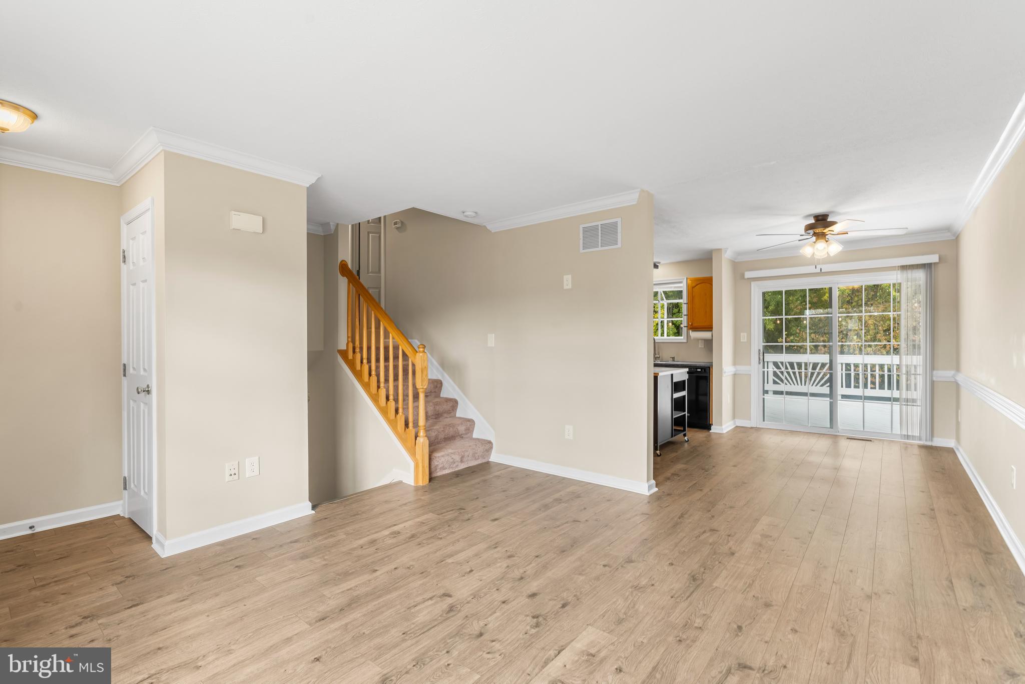 3836 Dakota Road Hampstead, MD 21074 - Photo 10 of 47 a view of an empty room with wooden floor and a window