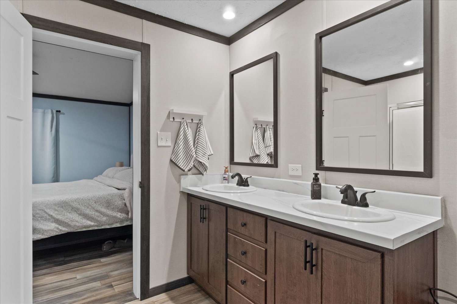 1416 South High Street Columbia, TN 38401 - Photo 18 of 24 a en suite bathroom with a sink and a mirror