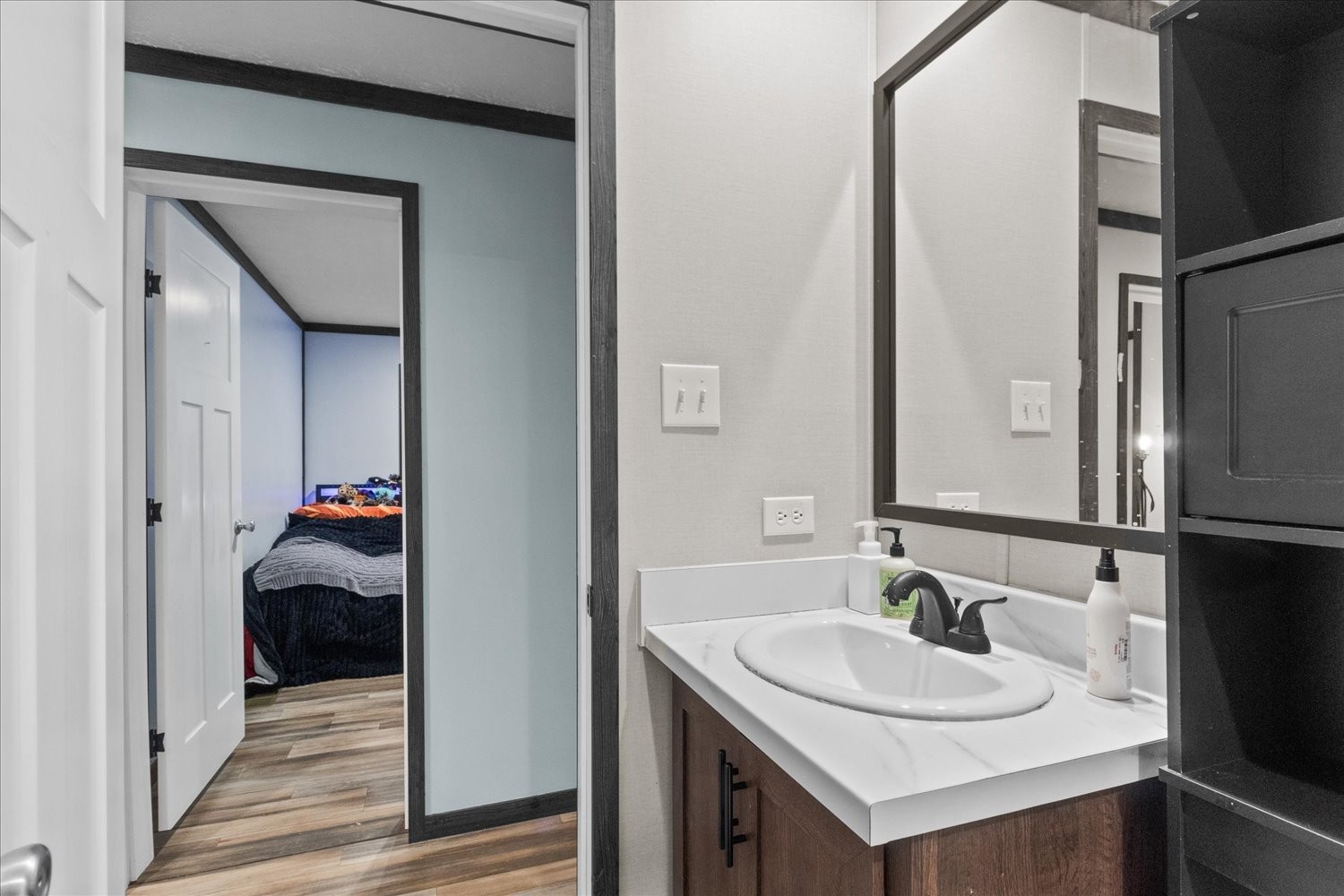 1416 South High Street Columbia, TN 38401 - Photo 23 of 24 a en suite bathroom with a sink and a mirror