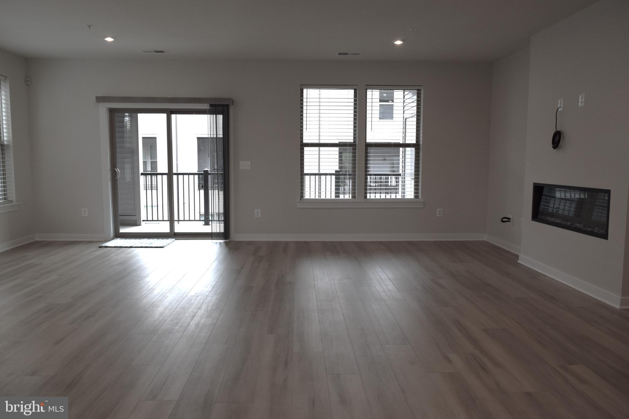 13542 Innovation Station Loop Herndon, VA 20171 - Photo 6 of 53 Living Room with Private Deck/Balcony access