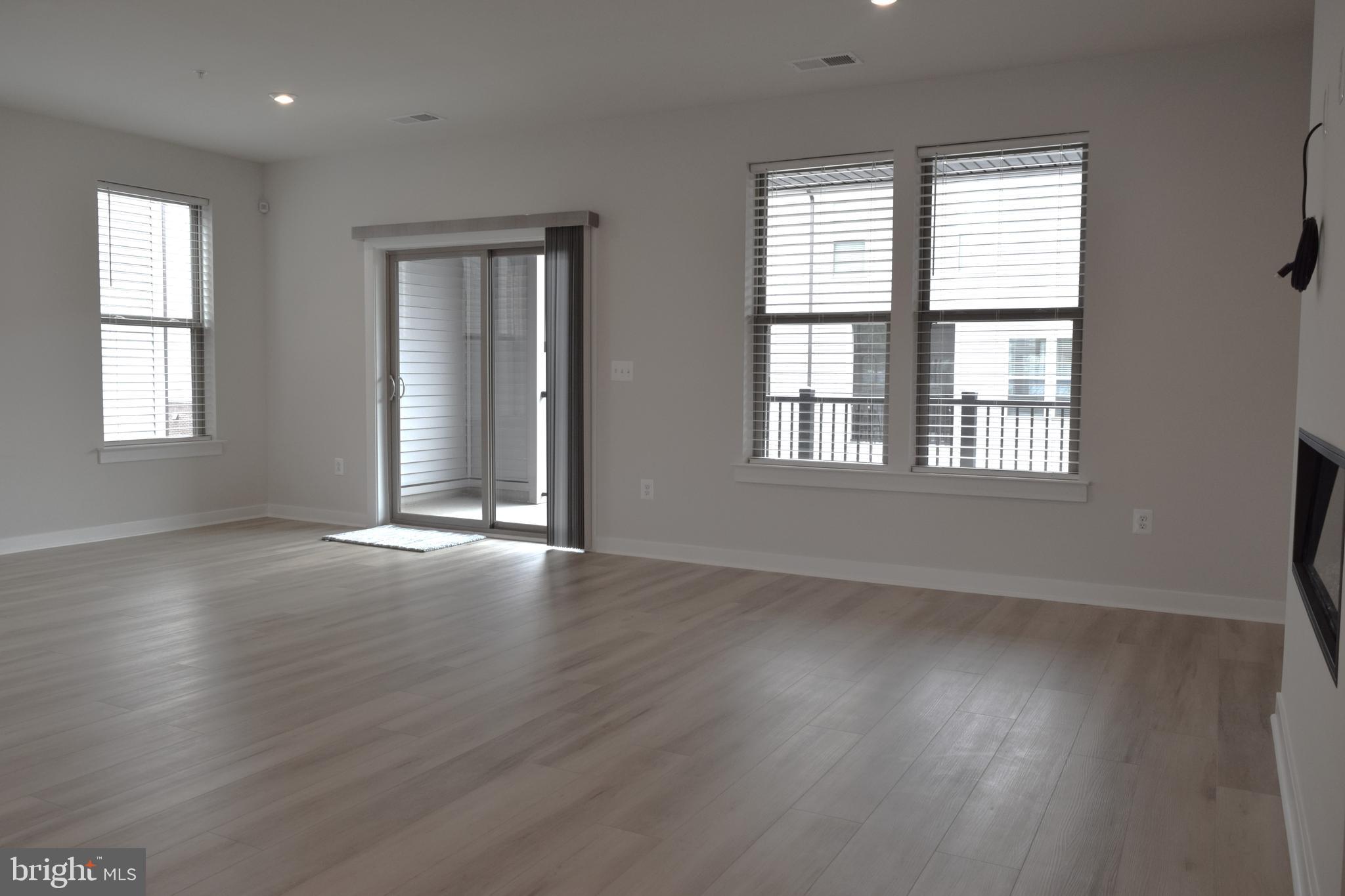 13542 Innovation Station Loop Herndon, VA 20171 - Photo 8 of 53 Lot of windows on Main Level