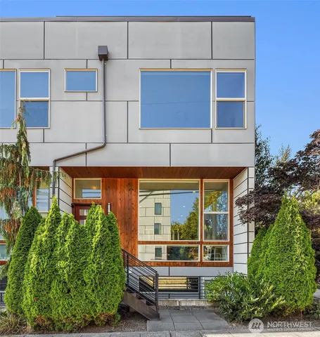 a front view of a building with garden