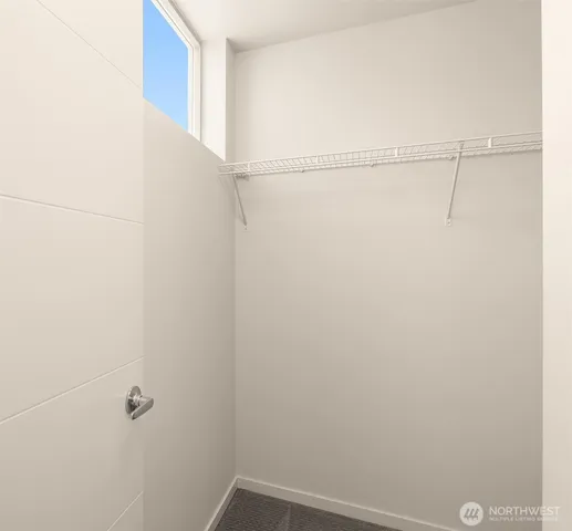 a view of a room with racks on the wall