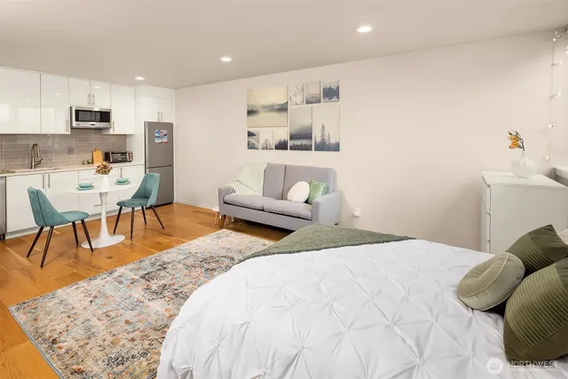 a bedroom with a bed and furniture