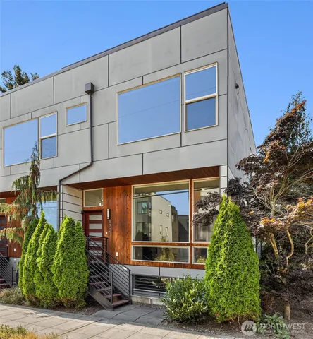 a front view of a building with garden