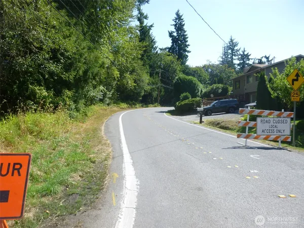 a view of a street with houses