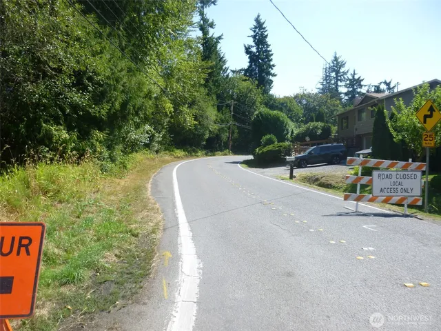 a view of a street with houses