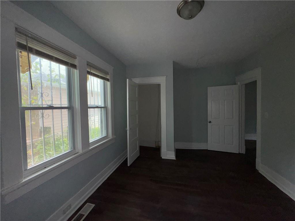 1462 Lucile Avenue Southwest Atlanta, GA 30310 - Photo 16 of 22 an empty room with windows