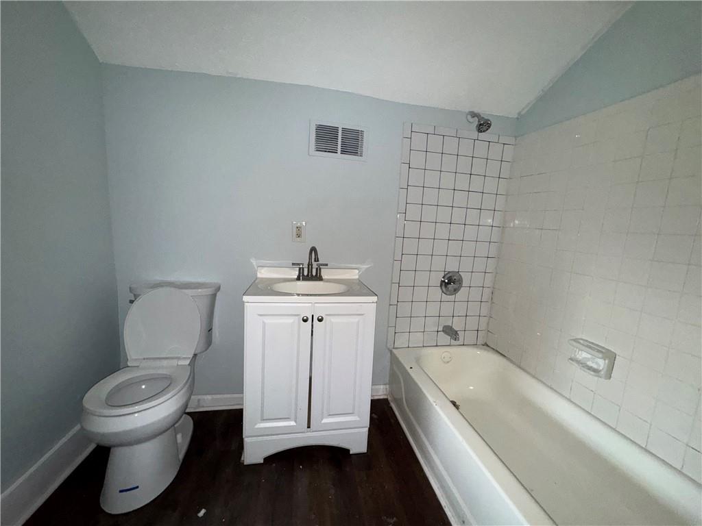 1462 Lucile Avenue Southwest Atlanta, GA 30310 - Photo 19 of 22 a bathroom with a toilet sink and bathtub