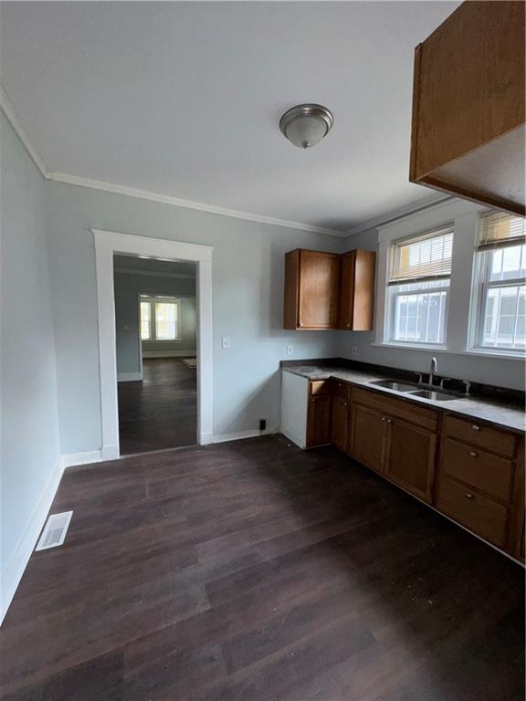 1462 Lucile Avenue Southwest Atlanta, GA 30310 - Photo 8 of 22 a large hall with wooden floor and front door