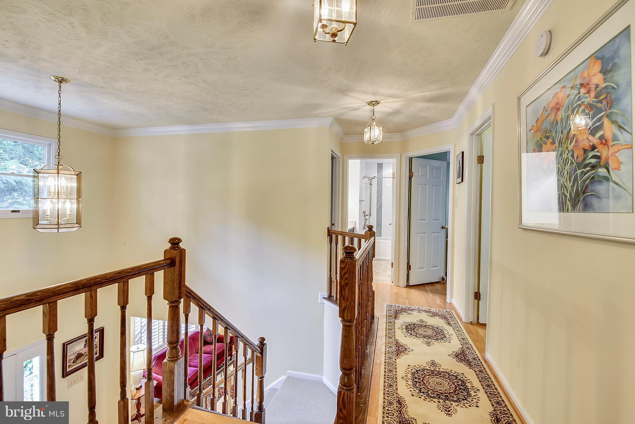 11692 Bennington Woods Road Reston, VA 20194 - Photo 19 of 29 a view of an entryway with wooden floor