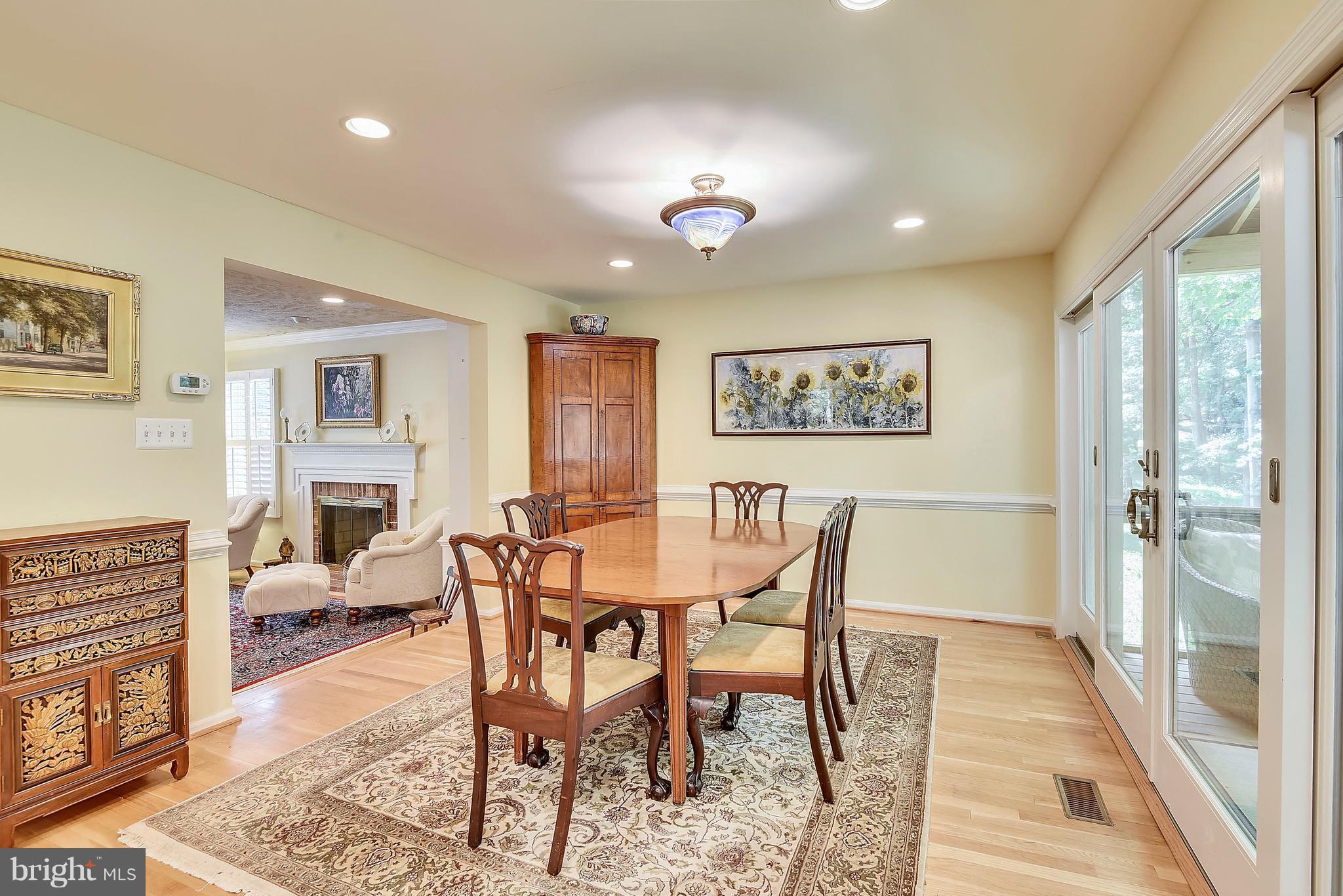 11692 Bennington Woods Road Reston, VA 20194 - Photo 6 of 29 a view of a dining room with furniture window and wooden floor