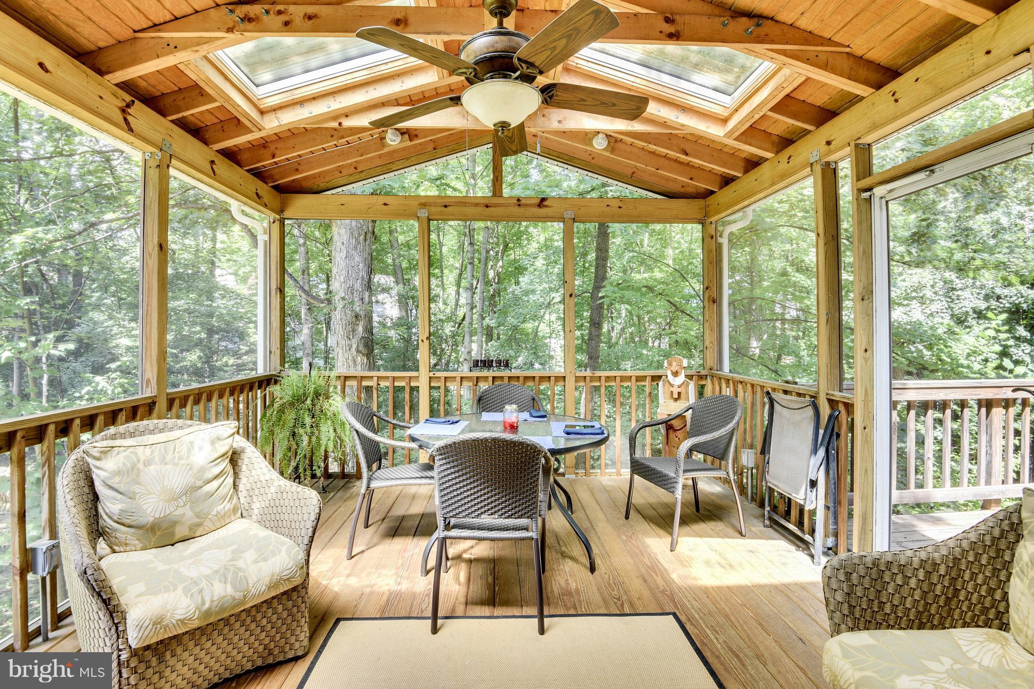 11692 Bennington Woods Road Reston, VA 20194 - Photo 7 of 29 a balcony with furniture and large windows