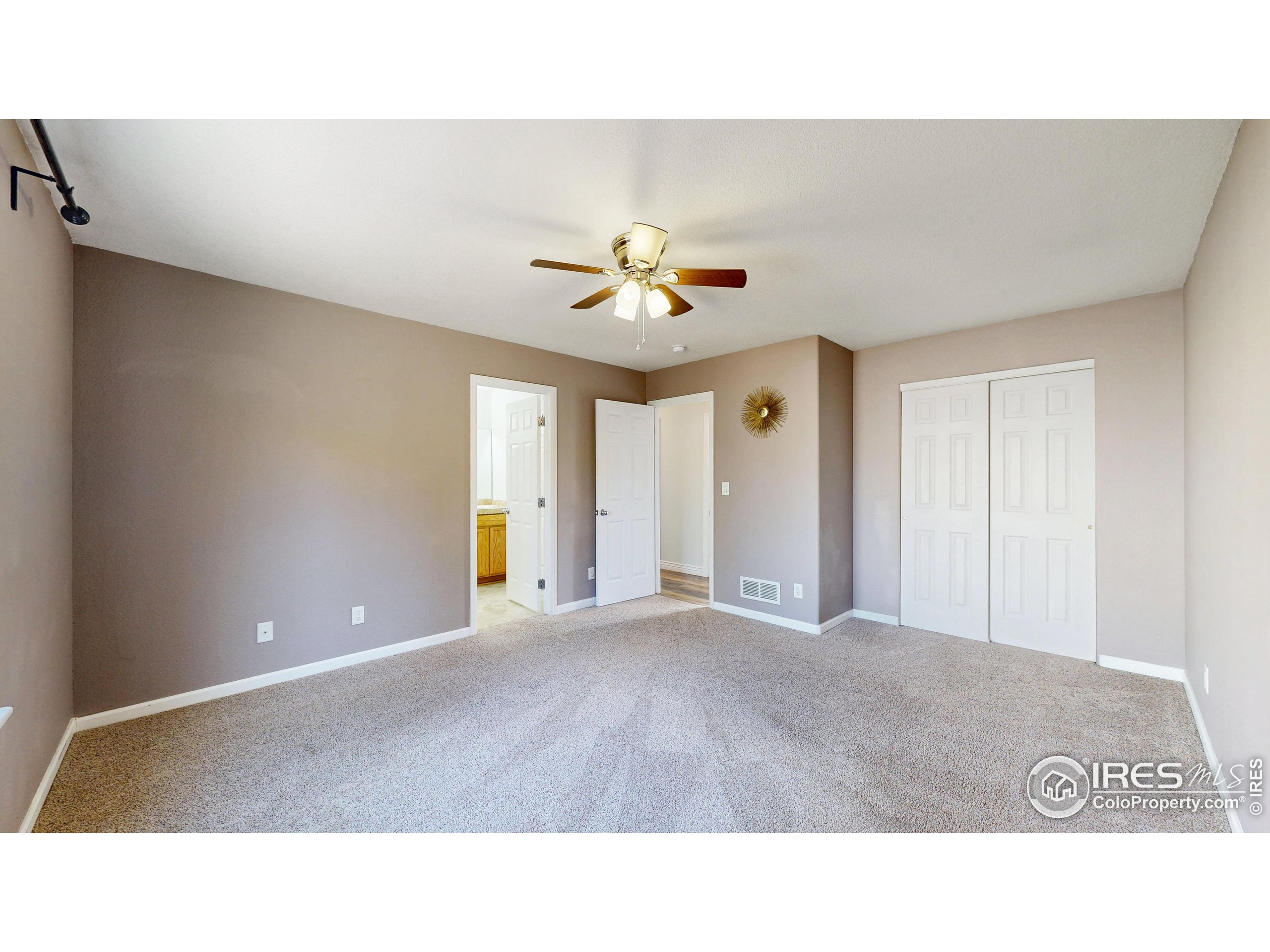 315 Coal Ridge Drive Frederick, CO 80530 - Photo 11 of 25 a open hall with a ceiling fan
