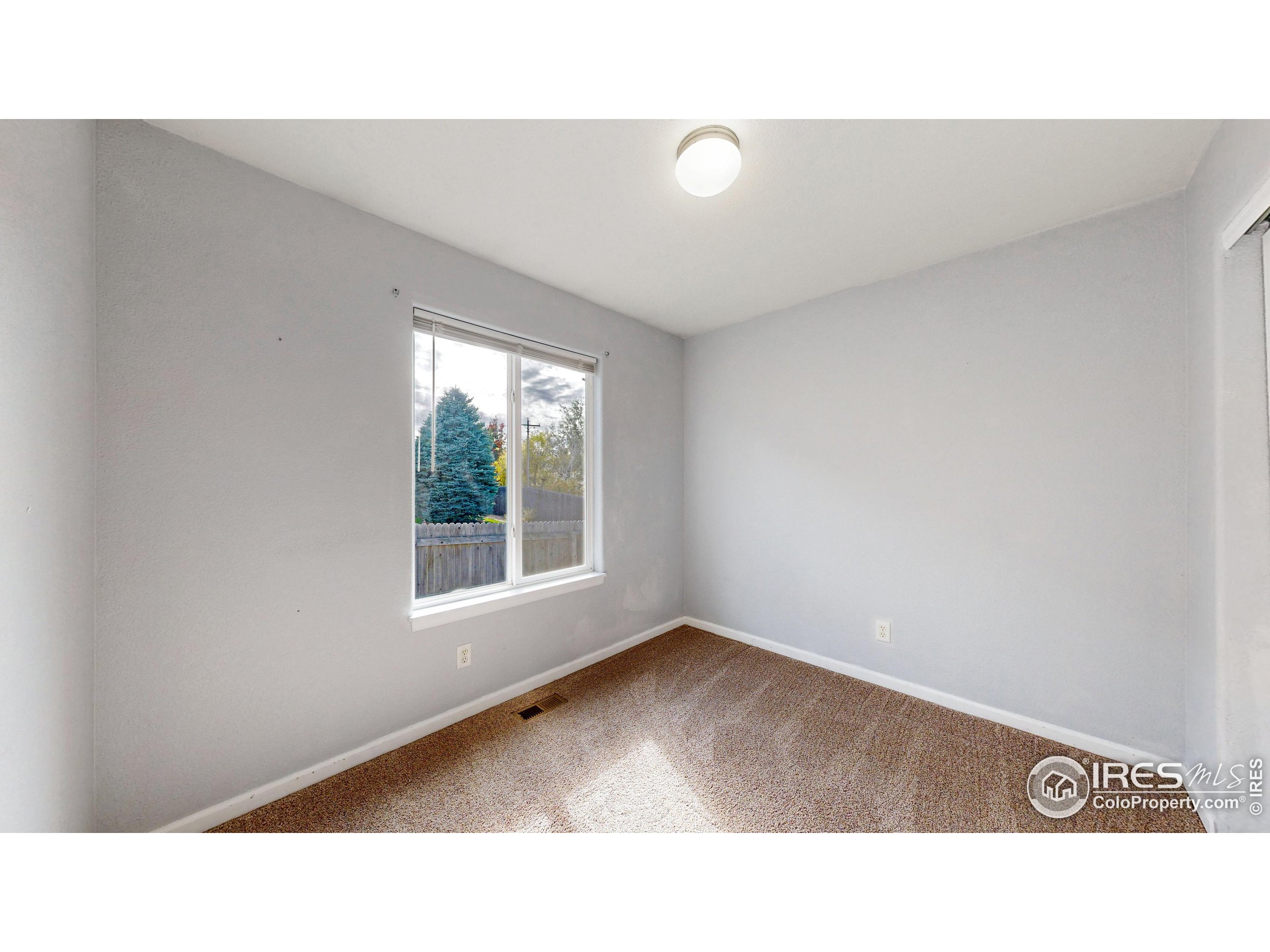 315 Coal Ridge Drive Frederick, CO 80530 - Photo 12 of 25 a open hall with a window
