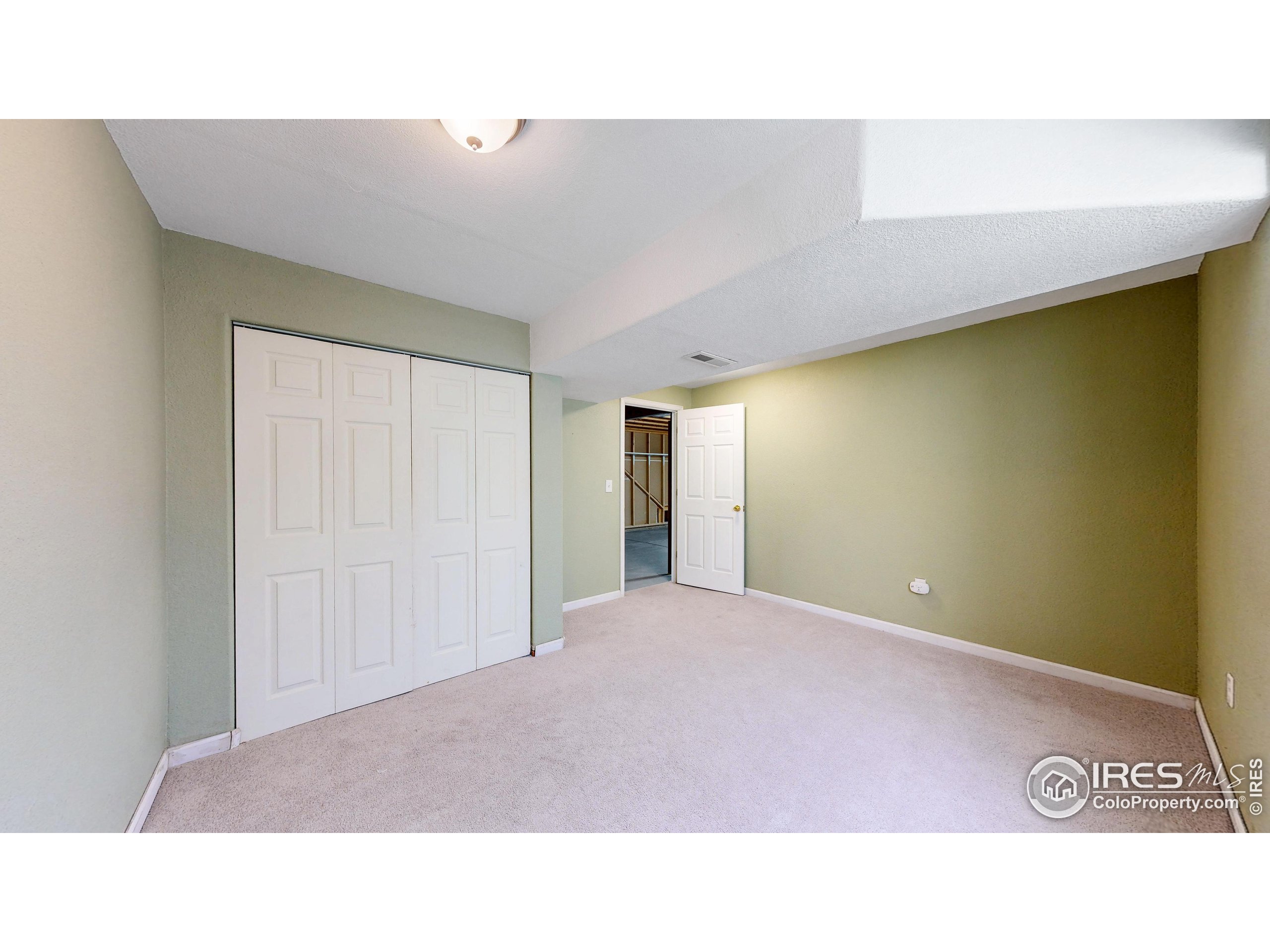 315 Coal Ridge Drive Frederick, CO 80530 - Photo 18 of 25 a open hall with stairs