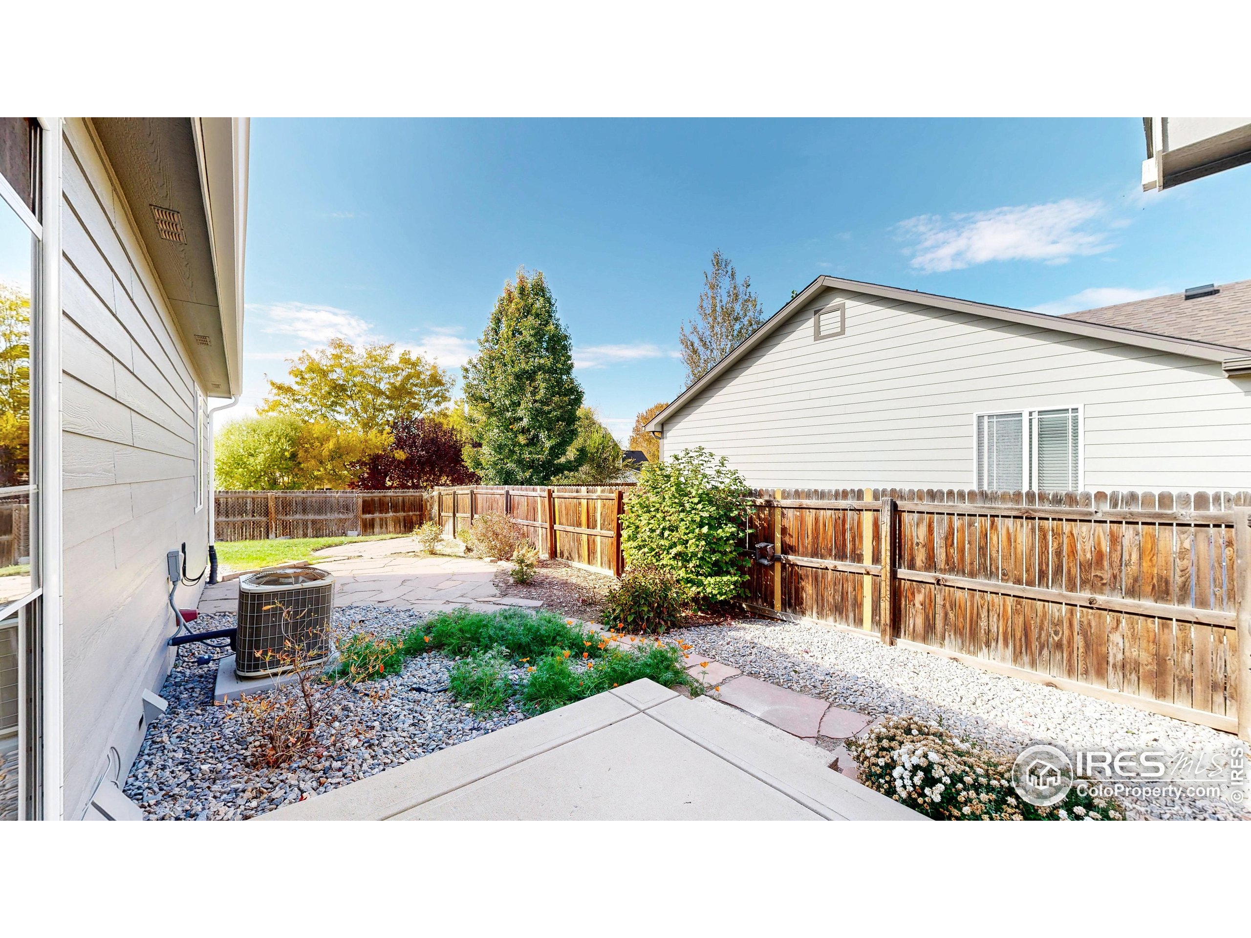315 Coal Ridge Drive Frederick, CO 80530 - Photo 21 of 25 a view of a house with backyard and porch