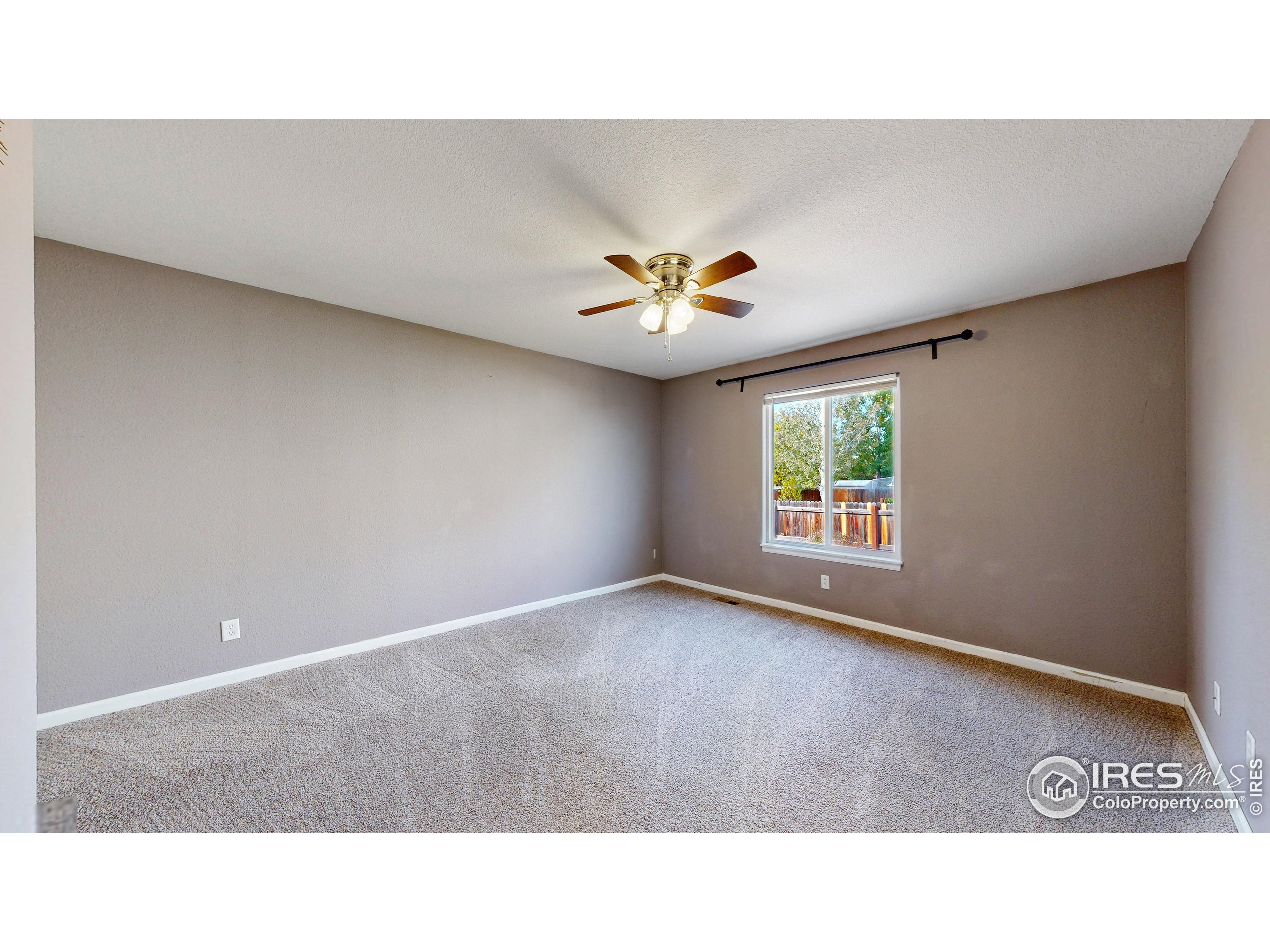 315 Coal Ridge Drive Frederick, CO 80530 - Photo 10 of 25 a black and white photo of a living room