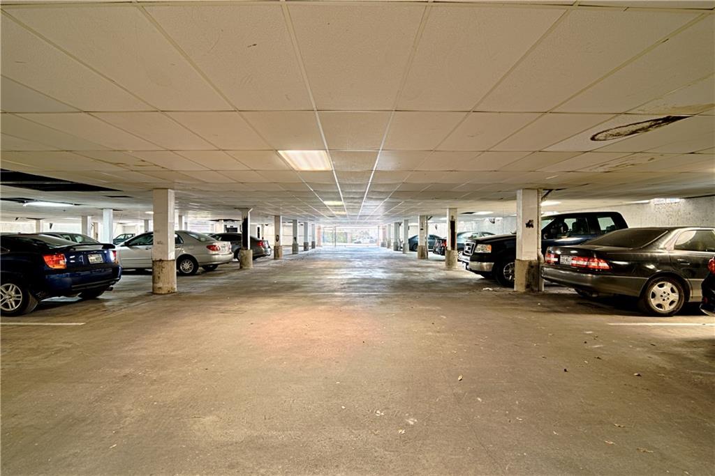 2401 Leon Street, Unit 104 Austin, TX 78705 - Photo 16 of 21 a view of parking space with parked cars