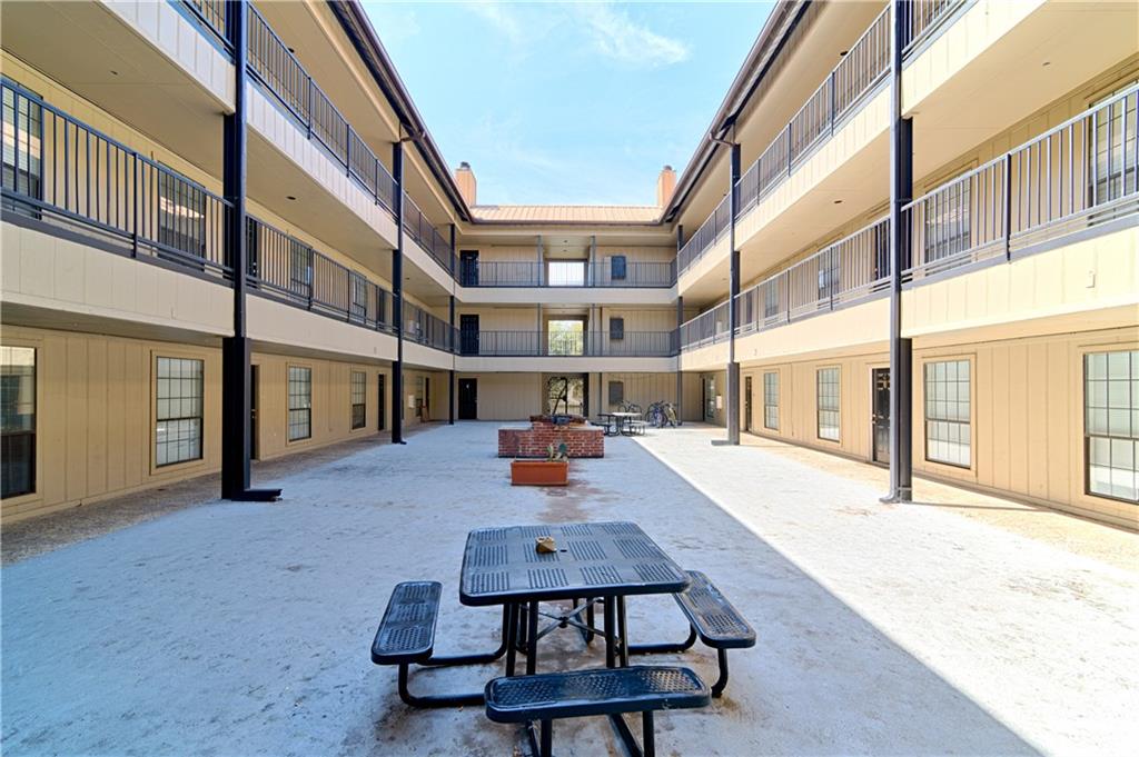 2401 Leon Street, Unit 104 Austin, TX 78705 - Photo 17 of 21 a view of a building with sitting area