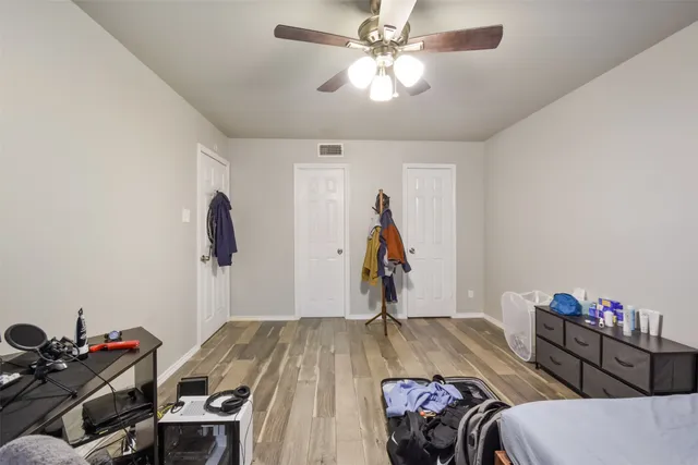 a bed room with a bed and furniture