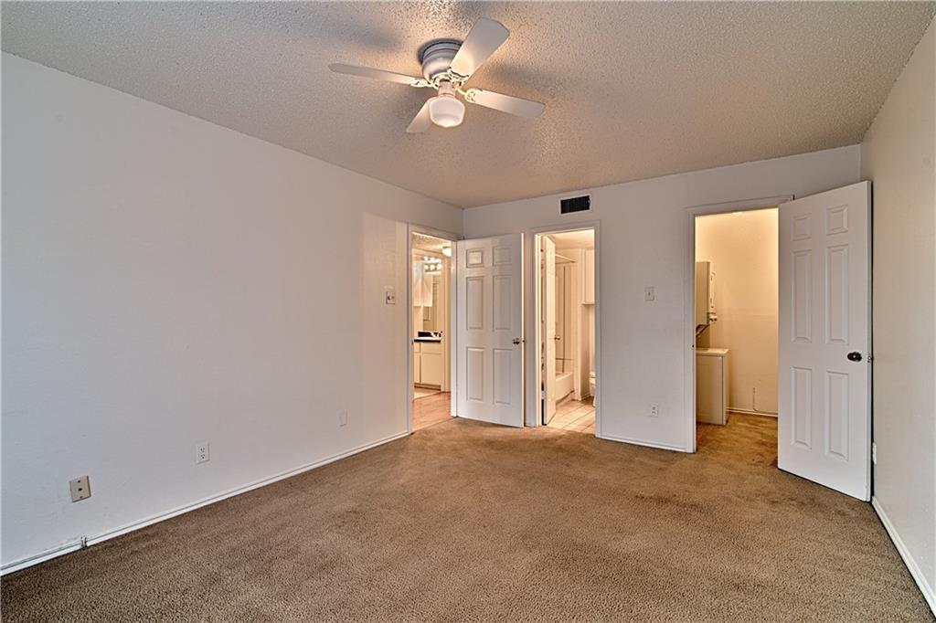 2401 Leon Street, Unit 104 Austin, TX 78705 - Photo 10 of 21 an empty room with fan and a ceiling fan