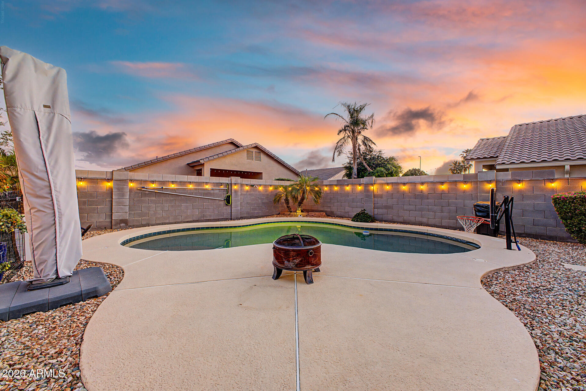 1393 East Tulsa Street Gilbert, AZ 85295 - Photo 25 of 35 Sparkling Pool at Dusk