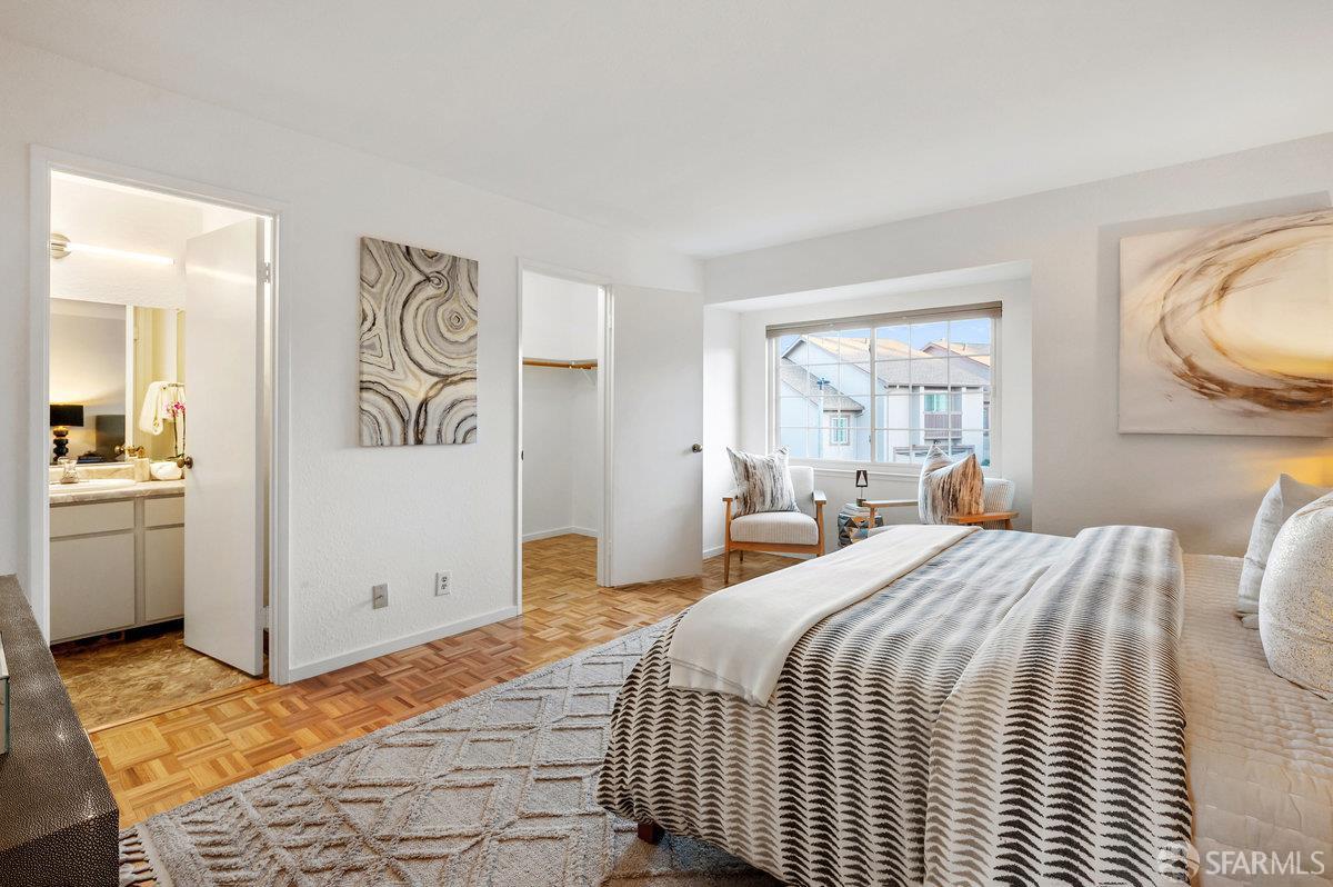 200 Bayview Circle San Francisco, CA 94124 - Photo 21 of 50 a bedroom with a bed and a window
