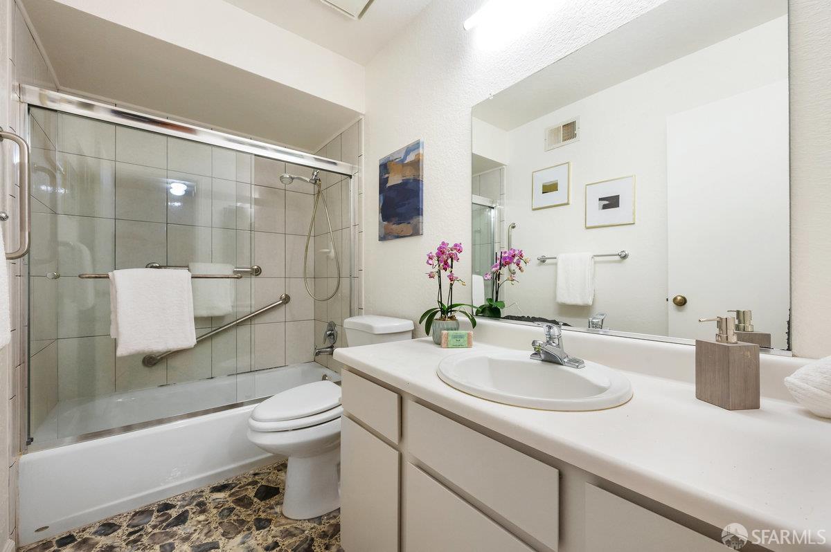 200 Bayview Circle San Francisco, CA 94124 - Photo 37 of 50 a bathroom with a sink a toilet and shower