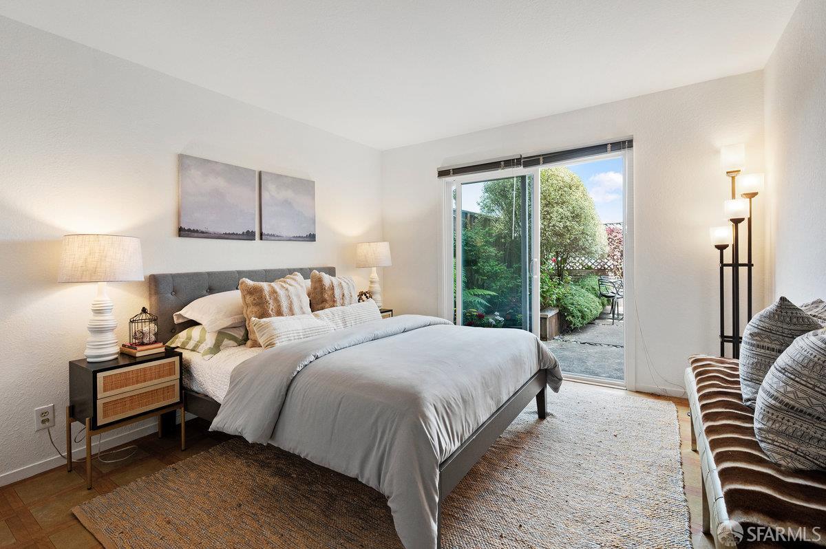 200 Bayview Circle San Francisco, CA 94124 - Photo 38 of 50 a bedroom with bed and a window