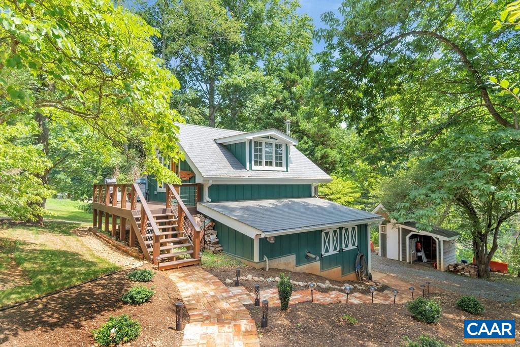 3609 Stony Point Road Charlottesville, VA 22911 - Photo 36 of 58 a front view of a house with a garden