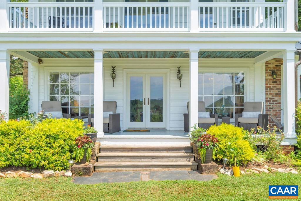 3609 Stony Point Road Charlottesville, VA 22911 - Photo 54 of 58 a front view of a house with a porch