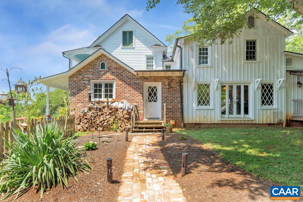 3609 Stony Point Road Charlottesville, VA 22911 - Photo 57 of 58 a front view of a house with a garden