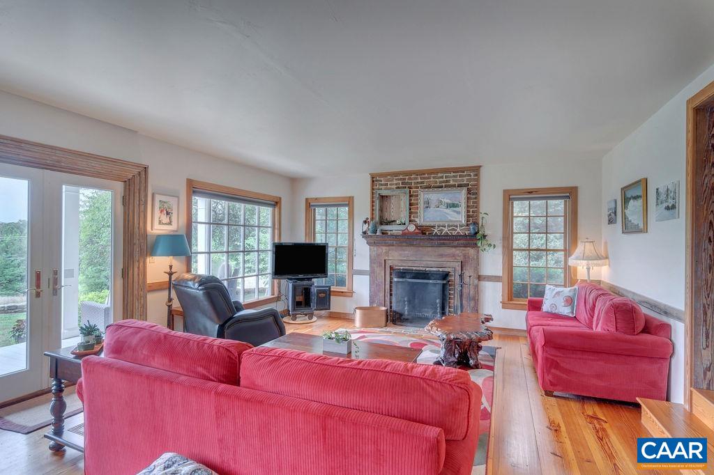 3609 Stony Point Road Charlottesville, VA 22911 - Photo 7 of 58 a living room with furniture or couch and a fireplace