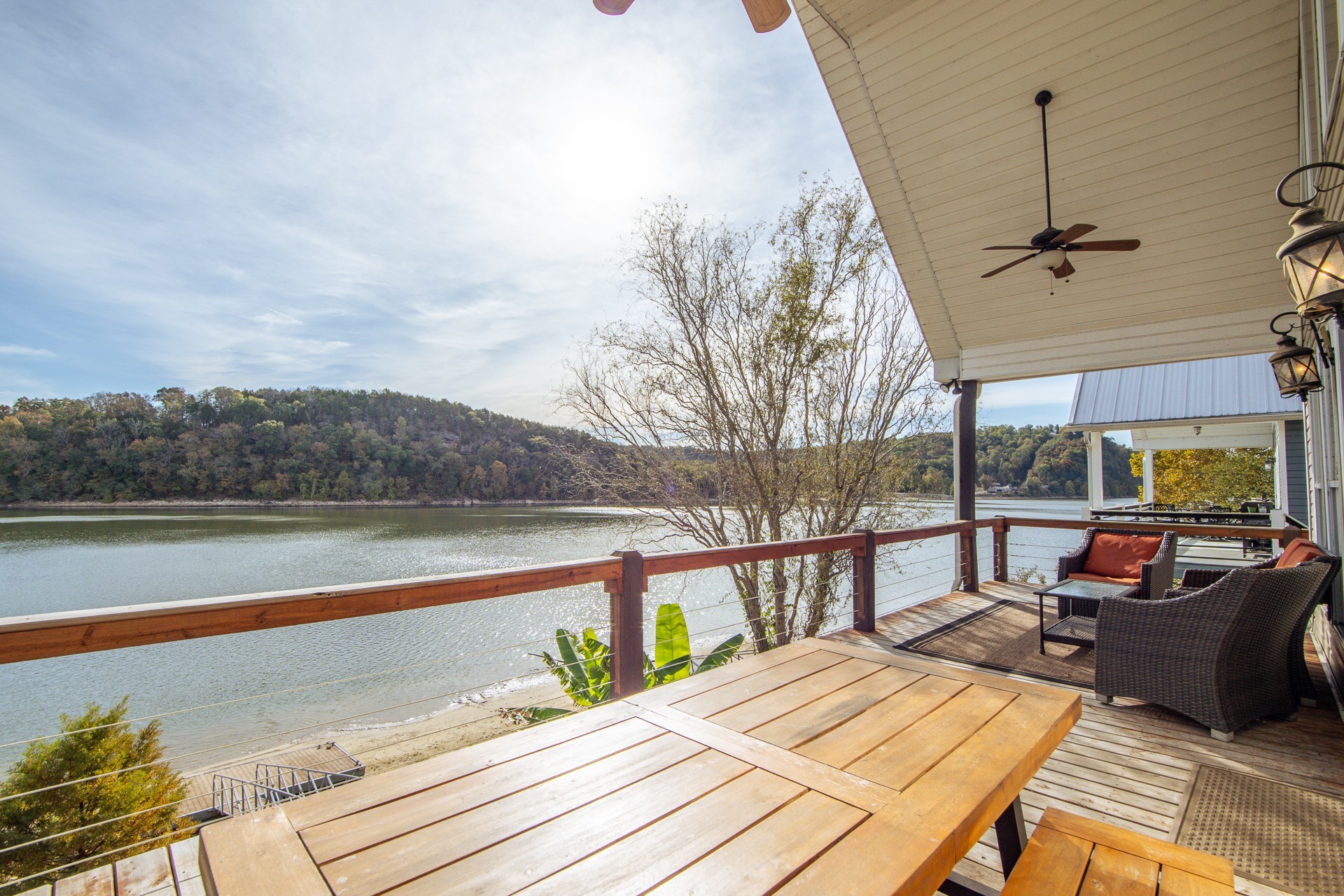 1040 Whites Creek Lane Decaturville, TN 38329 - Photo 13 of 80 a view of a balcony with two chairs and a table
