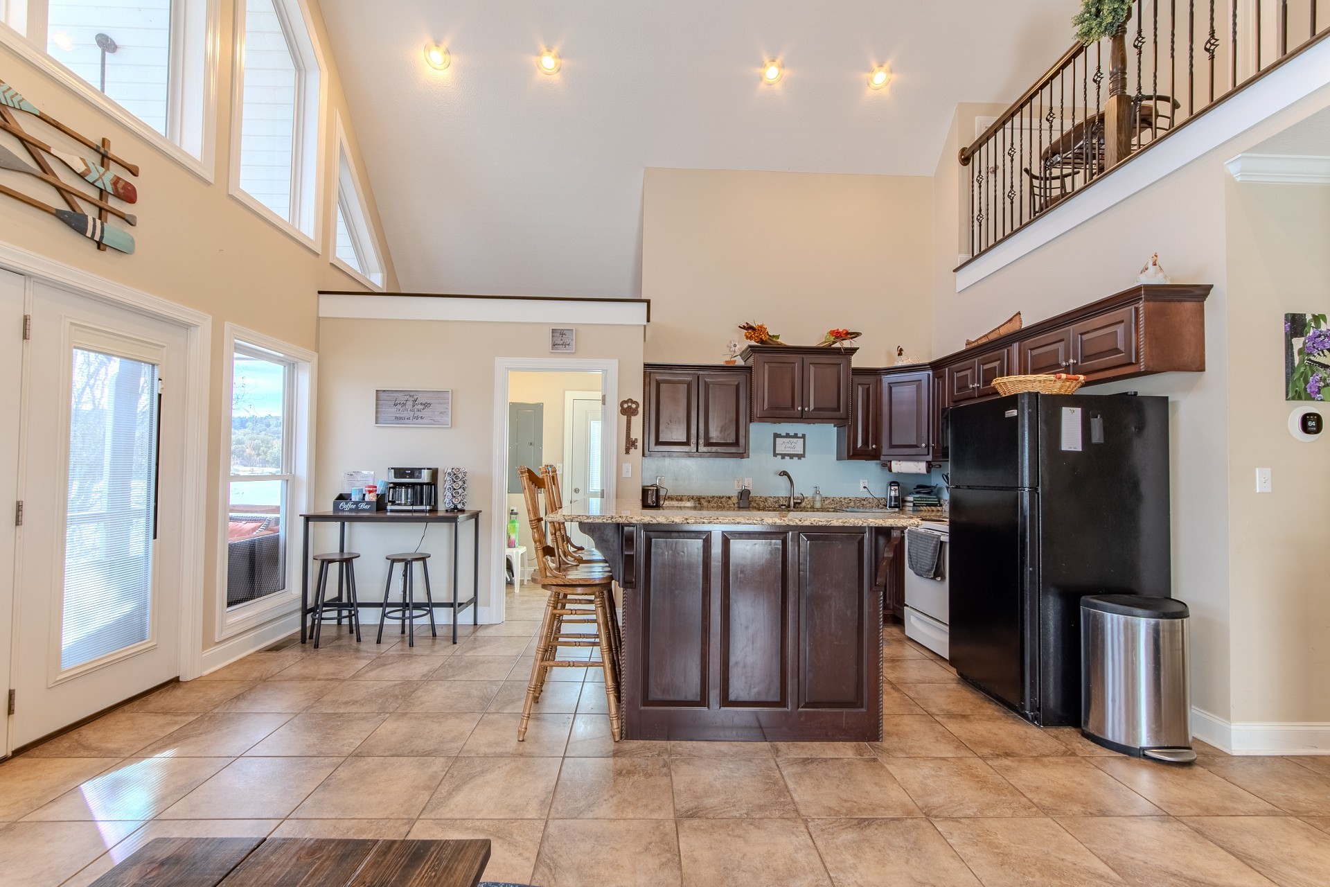 1040 Whites Creek Lane Decaturville, TN 38329 - Photo 24 of 80 a kitchen with stainless steel appliances granite countertop a refrigerator and a view of living room