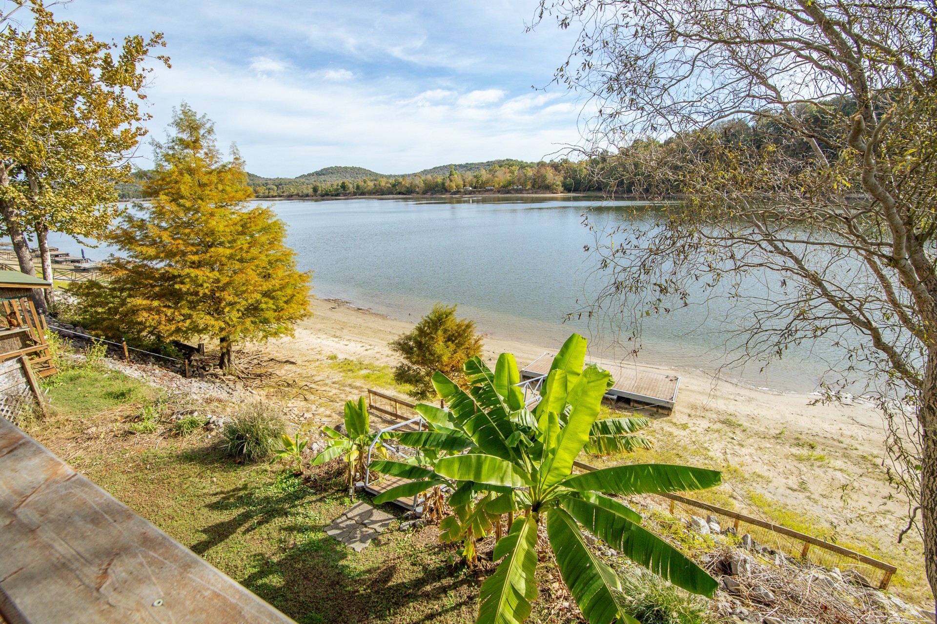 1040 Whites Creek Lane Decaturville, TN 38329 - Photo 5 of 80 a view of a lake with a mountain in the background
