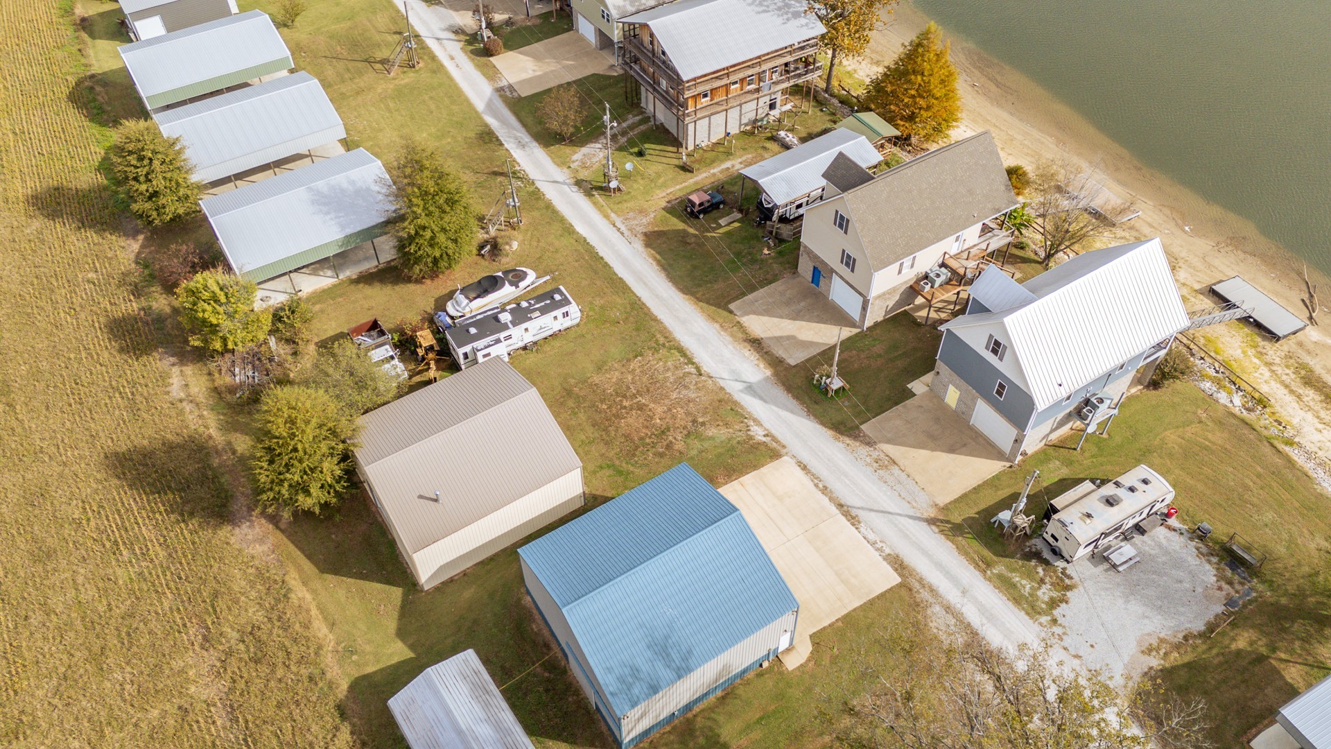 1040 Whites Creek Lane Decaturville, TN 38329 - Photo 58 of 80 an aerial view of a house with a yard