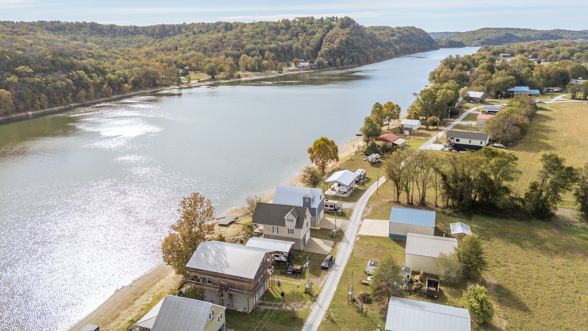 1040 Whites Creek Lane Decaturville, TN 38329 - Photo 68 of 80 a view of a lake with mountain