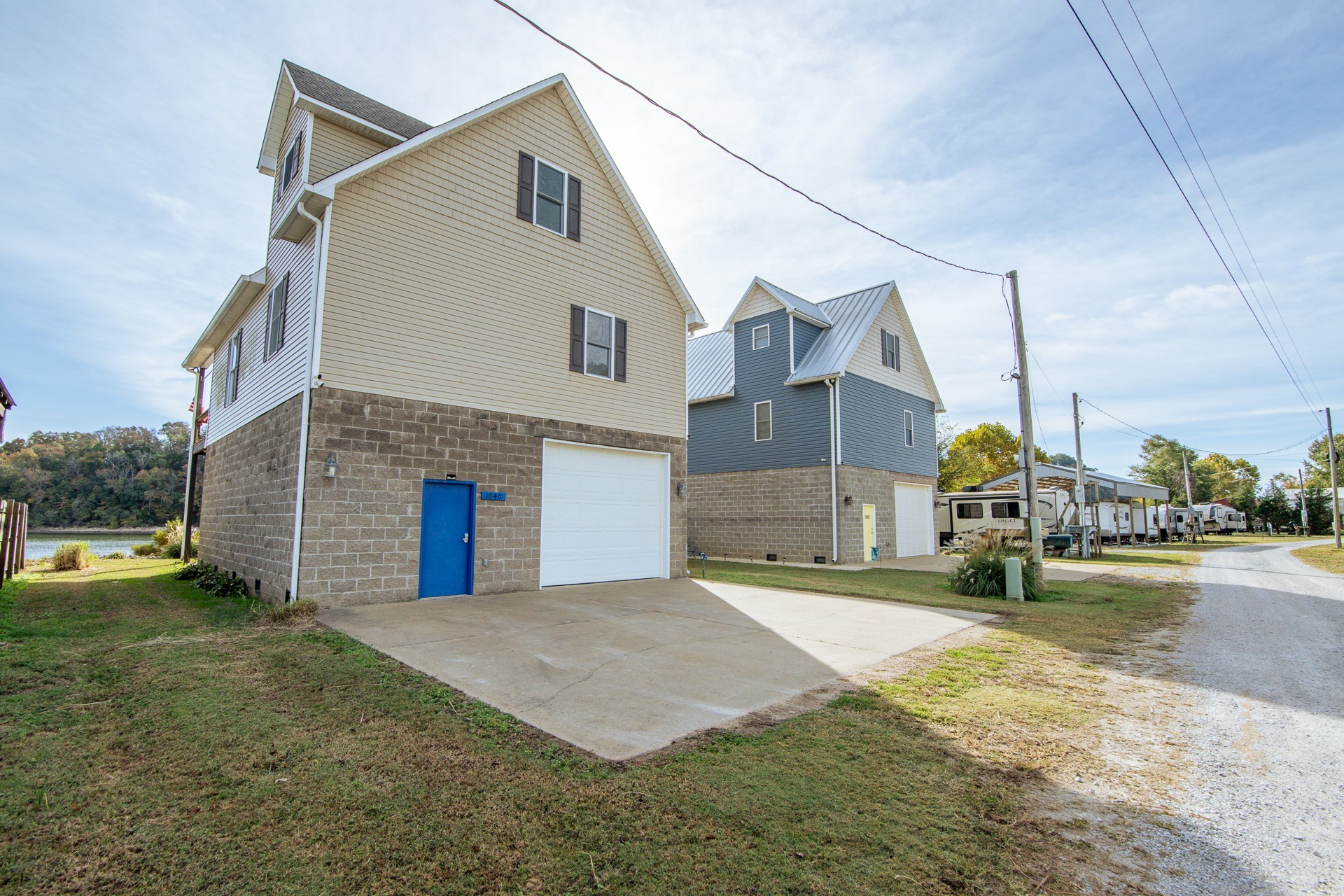 1040 Whites Creek Lane Decaturville, TN 38329 - Photo 70 of 80 a view of a house with a yard and garage
