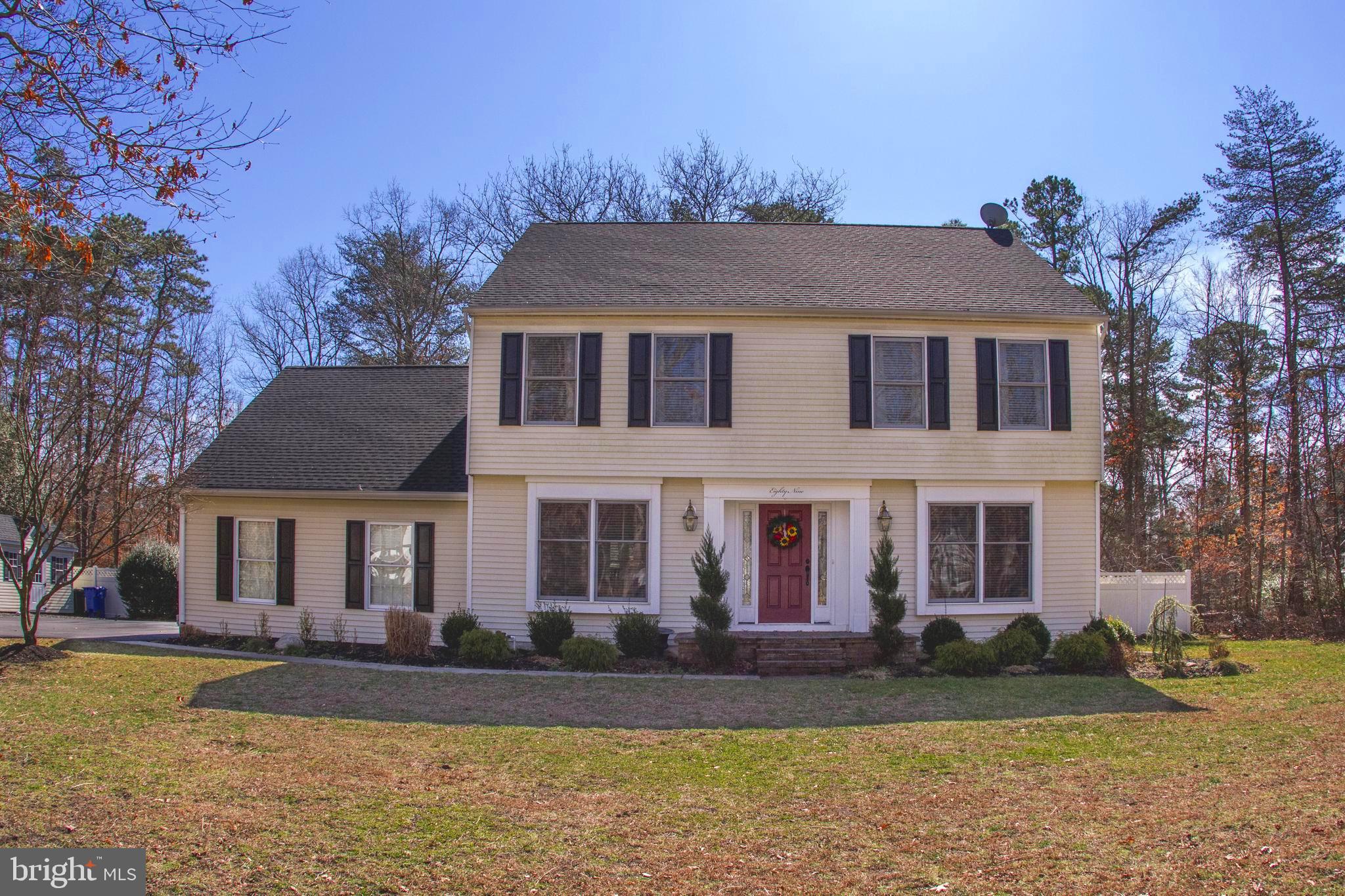 89 Flyatt Road Shamong, NJ 08088 - Photo 1 of 30 a front view of a house with garden