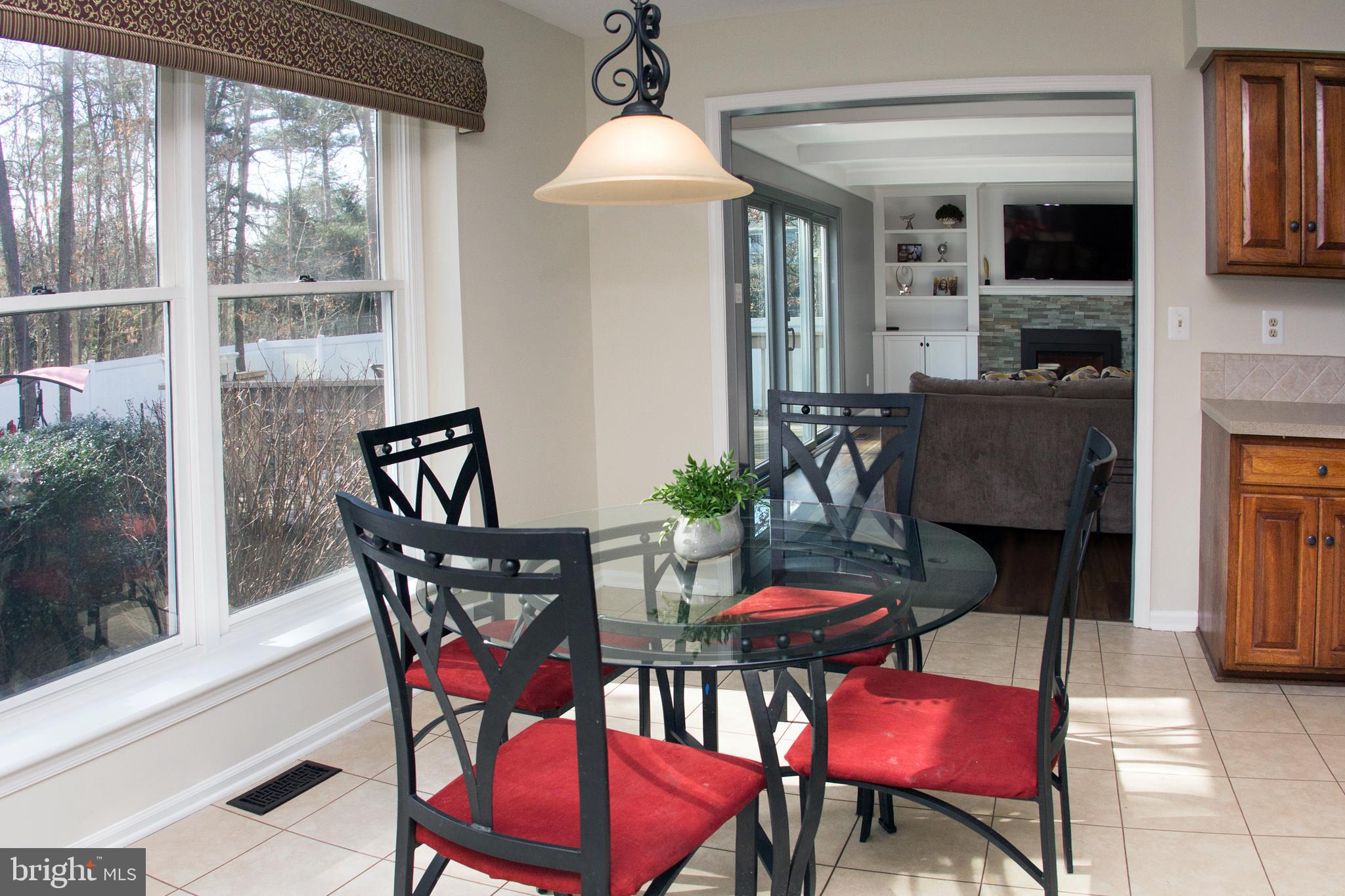 89 Flyatt Road Shamong, NJ 08088 - Photo 7 of 30 a view of a dining room with furniture and chandelier