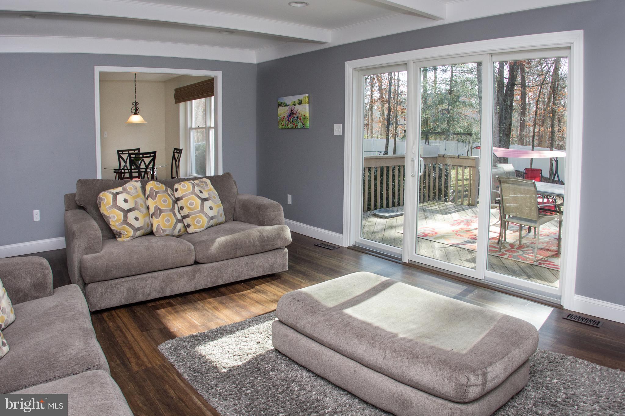 89 Flyatt Road Shamong, NJ 08088 - Photo 9 of 30 a living room with furniture and a large window