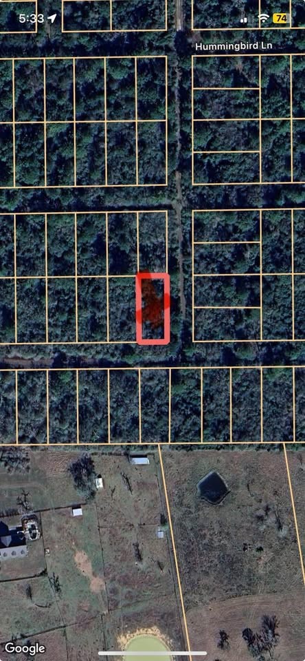 0 Cottontail Drive Hempstead, TX 77445 - Photo 7 of 7 a front view of a building with windows