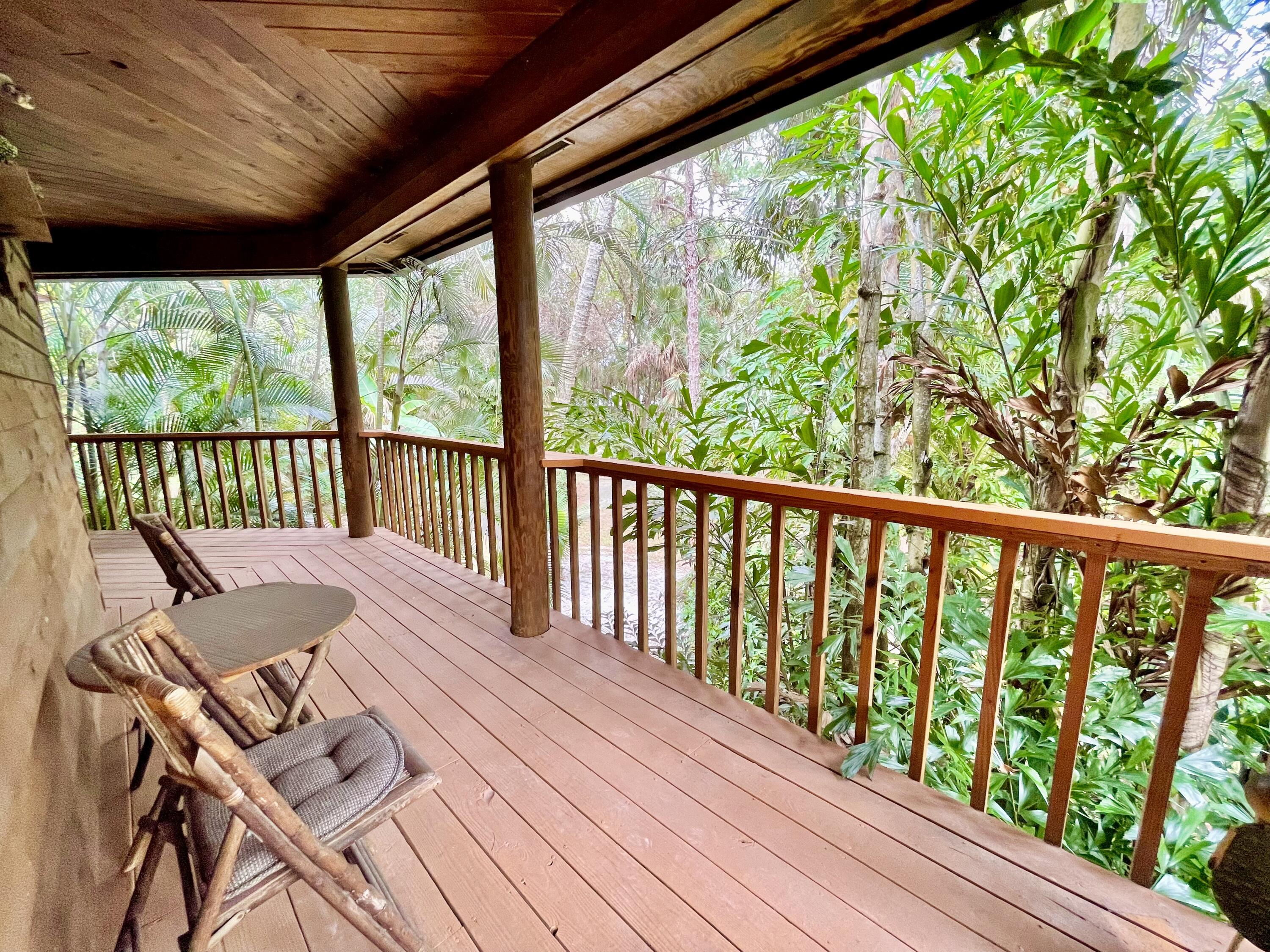 9470 Sandy Run Road Jupiter, FL 33478 - Photo 16 of 48 a view of balcony with wooden floor